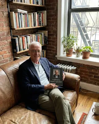 Richard holding his finished Ethos book